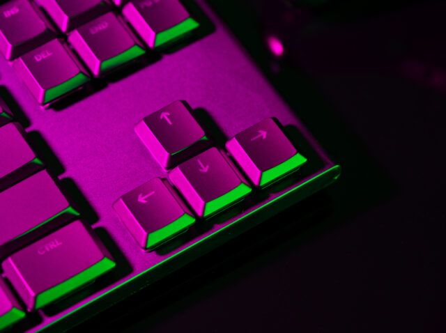 Close up of computer keyboard on black background