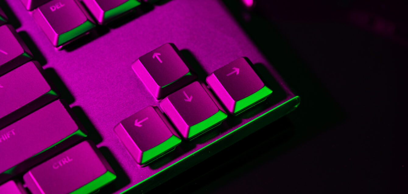 Close up of computer keyboard on black background