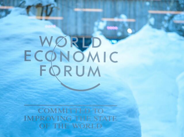 World Economic Forum logo in Davos with snowy background, representing AI-driven disruption in brand strategy and trust by 2030